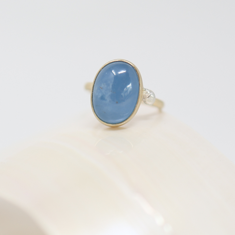 sailor's valentine oval aquamarine and tiny seashell ring by Hannah Blount