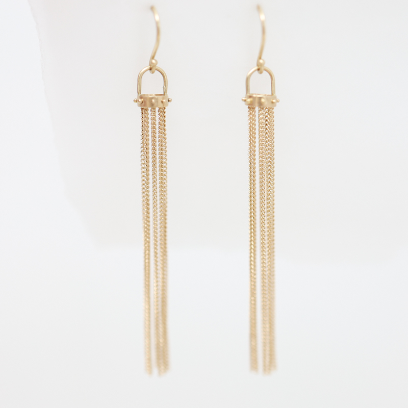 Hilary Finck gold tassel earrings