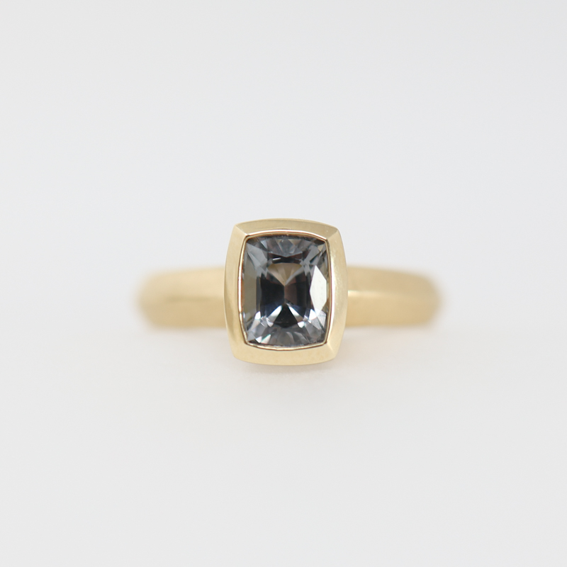 Karin Jacobson fairmined gold gray spinel heavy bezel ring