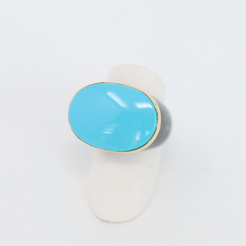 oval turquoise and carved jade cocktail ring