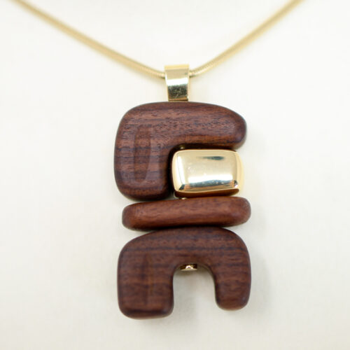 Joelle Kharrat wood and gold pendant Salt Hill Jewelry store Fargo