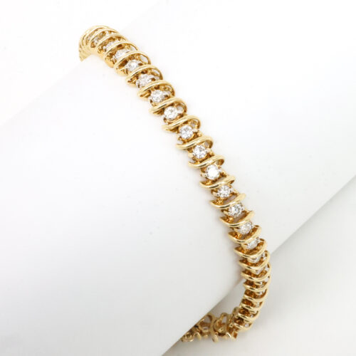 dimensional diamond tennis bracelet, estate diamond and yellow gold bracelet