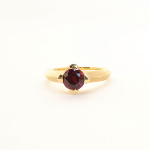 Karin Jacobson grape garnet prong set ring with knife edge if fairmined gold
