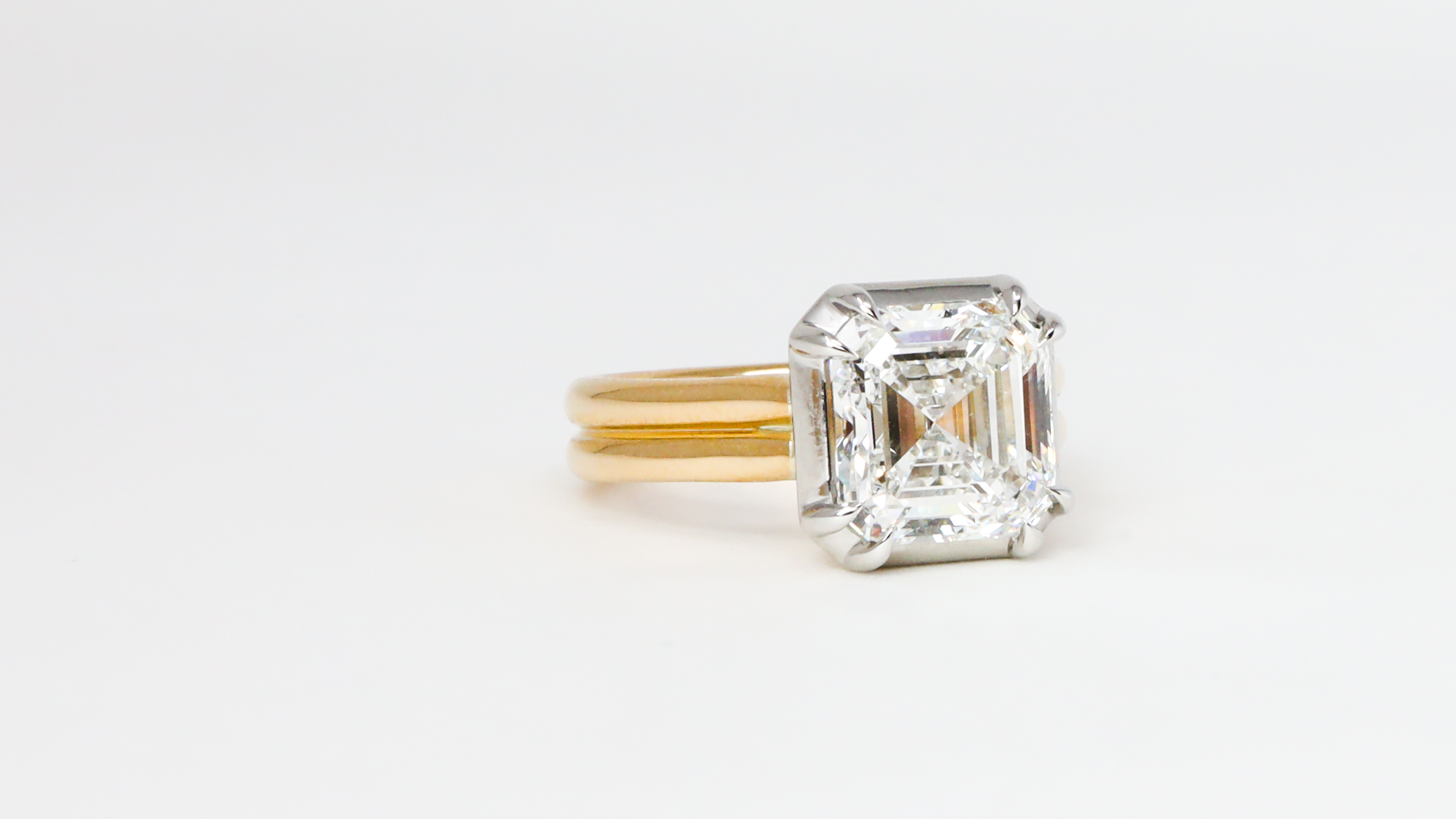 Custom engagement ring asscher cut Salt Hill Jewelry downtown Fargo custom engagement rings fargo Salt Hill Jewelry downtown Fargo - asscher cut platinum and gold unique engagement ring